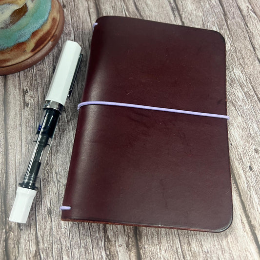 Mahogany burgundy TN with lavender string, Pocket Size