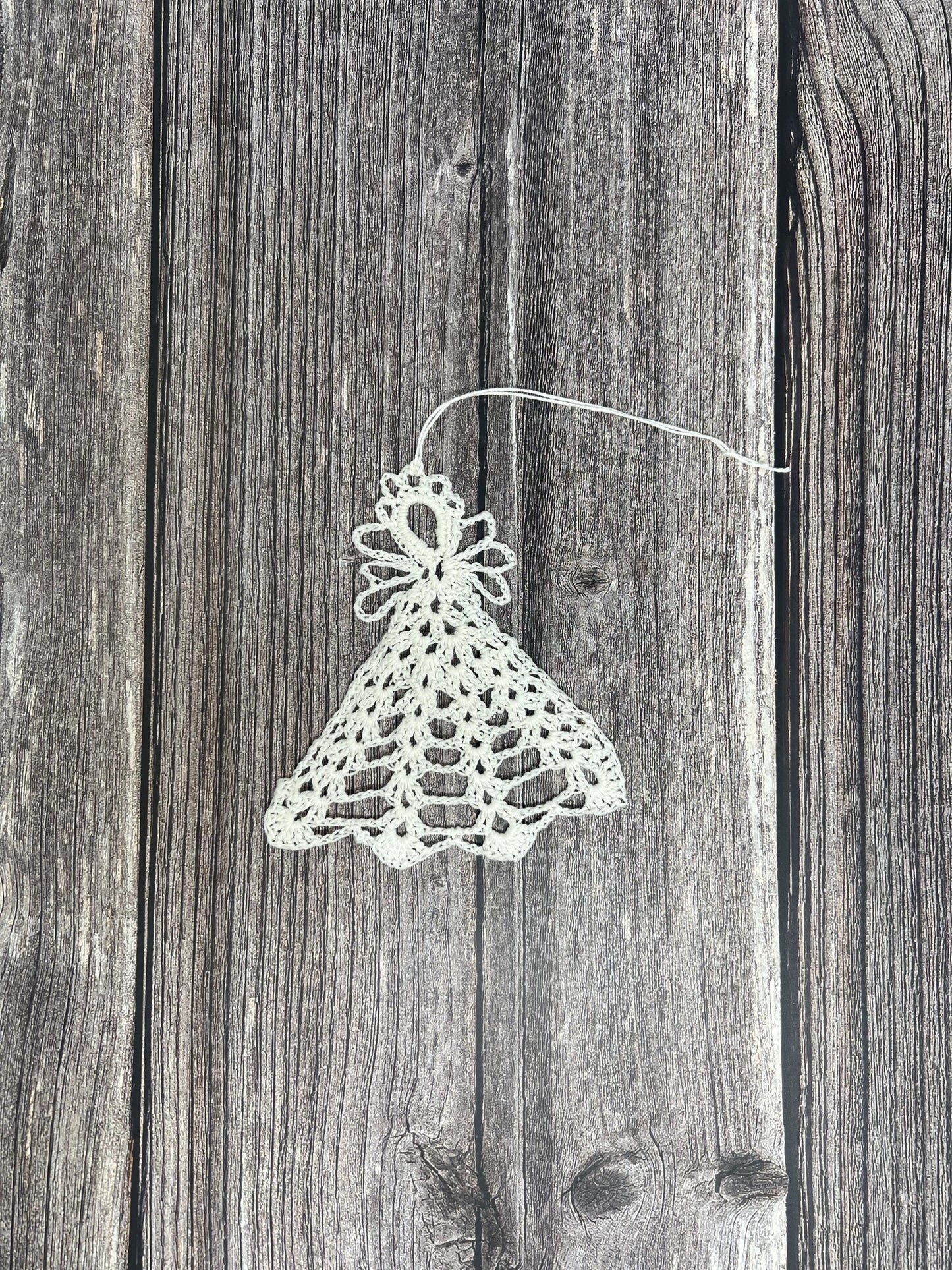 5" crocheted angel lace ornament, 100% cotton. stiffened to hang for decor